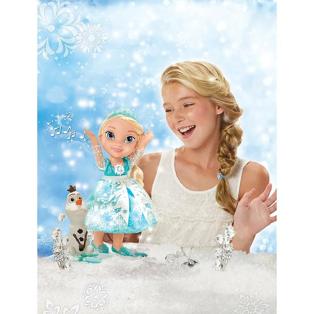 Disney Frozen Snow Glow Elsa Light Up/Singing Doll and an Olaf Doll